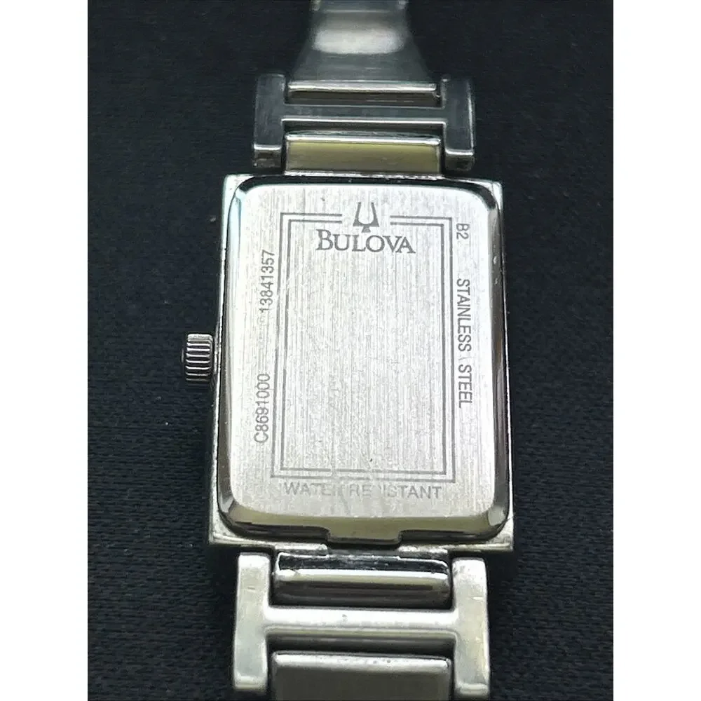 Bulova Black Dial Silver Case And Band Women’s Quartz Watch ( With Box)